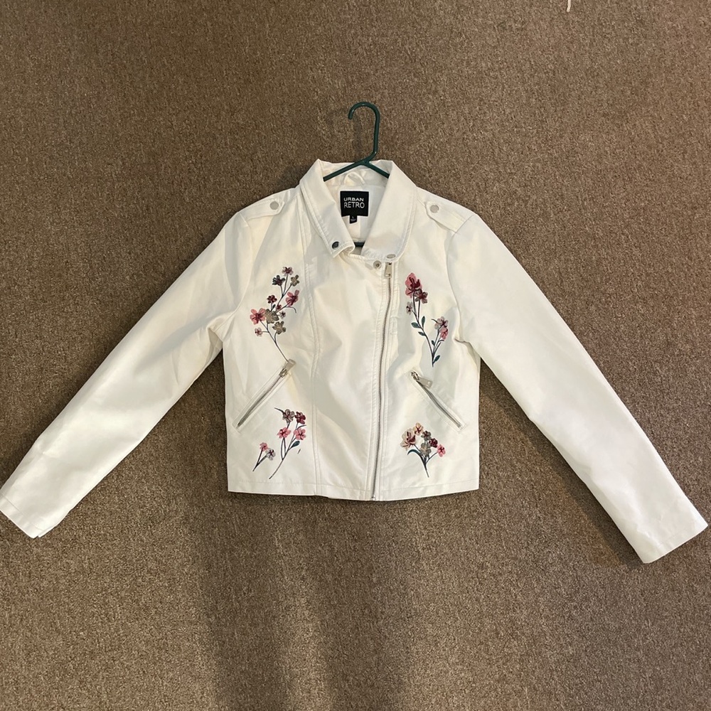 White faux leather jacket with embroidered flowers